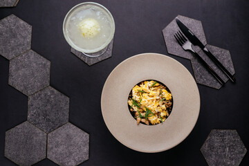 Wall Mural - Spanish paella on a black background