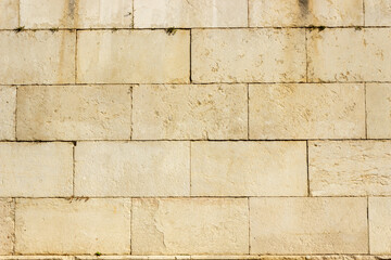 Wall Mural - Big yellow stone block background texture