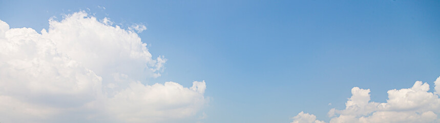 Wall Mural - Image of a partly cloudy and partly clear sky during the day