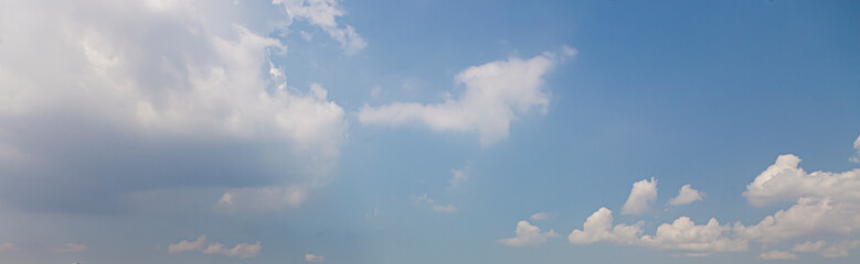 Wall Mural - Image of a partly cloudy and partly clear sky during the day