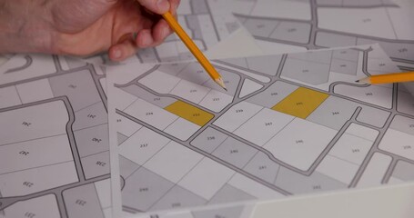 Wall Mural - people discussing about territory building plots on cadastral map