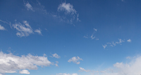 Image of a partly cloudy and partly clear sky during the day