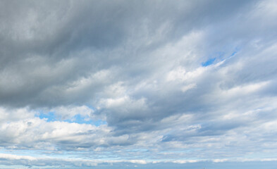 Image of a partly cloudy and partly clear sky during the day