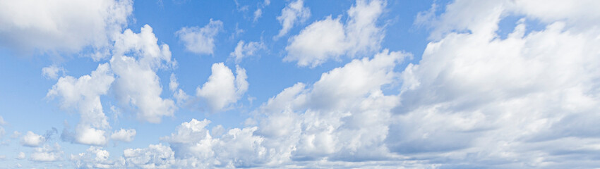 Wall Mural - Image of a partly cloudy and partly clear sky during the day