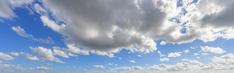 Wall Mural - Image of a partly cloudy and partly clear sky during the day