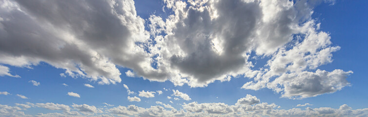 Wall Mural - Image of a partly cloudy and partly clear sky during the day