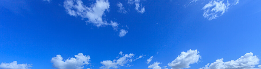 Wall Mural - Image of a partly cloudy and partly clear sky during the day