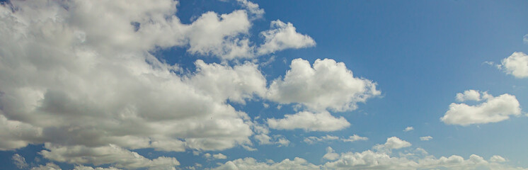Wall Mural - Image of a partly cloudy and partly clear sky during the day