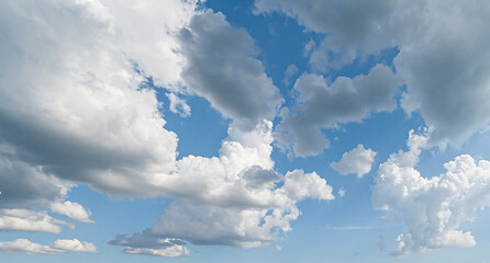 Wall Mural - Image of a partly cloudy and partly clear sky during the day