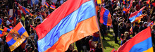 Armenian Flags On The Background Of A Demonstration Of Thousands Of People.
