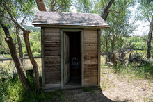 Old Outhouse Toliet In Bannack Ghost Town In Montana