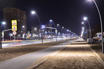 Road and lanterns in the night city