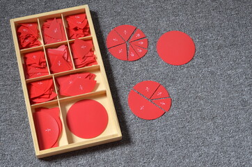 montessori math fraction material in wooden box