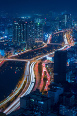 Wall Mural - Nightscape of Ho Chi Minh City near Sai Gon River, Vietnam.