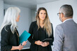 © Mangostar - Serious worried female manager with tablet reporting to company CEO. Medium shot. Business communication concept