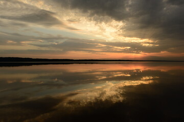 Wall Mural - Reflection of the twilight sky in the water of the lake
