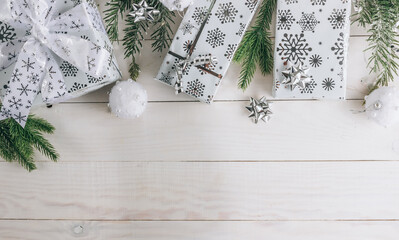 Wall Mural - Christmas Decorations and a Gift Box. Christmas White background. Flat lay.