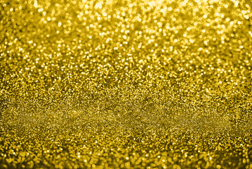 Wall Mural - Yellow bokeh abstract light defocused background.