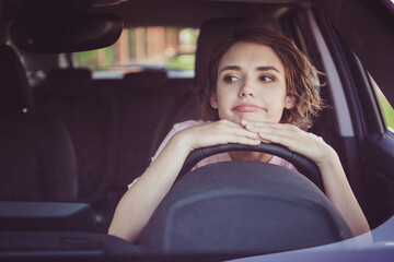 photo of exhausted girl ride drive car stuck traffic jam hold hand steering wheel look front window 