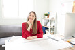 © AntonioDiaz - Happy architect in her office