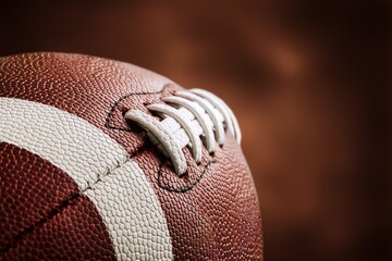 Wall Mural - American leather football ball on background