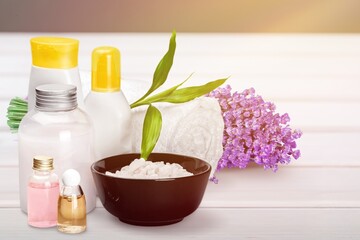 Wall Mural - Pile of lavender flowers and a dropper bottle with lavender essence