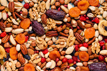 Wall Mural - Background from various nuts and dried fruits