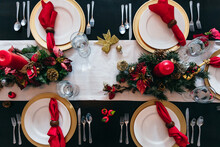 Overhead View Of Holiday Christmas Dinner Table Setting