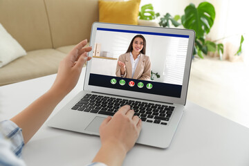 Poster - Coworkers working together online. Woman using video chat on laptop, closeup