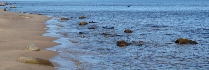 Sticker - Water view with granite stones.