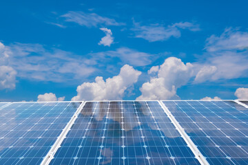 solar panel on blue sky background. green grass and cloudy sky, solar power green energy for life co