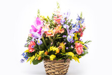 Bouquet Of Bright Flowers In Basket Isolated On White Background. Mothers Day Or Valentines Day Concept