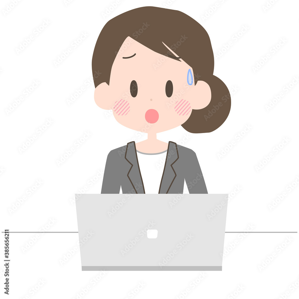 困った表情でノートパソコンを操作するビジネスウーマン Dcn Gallery