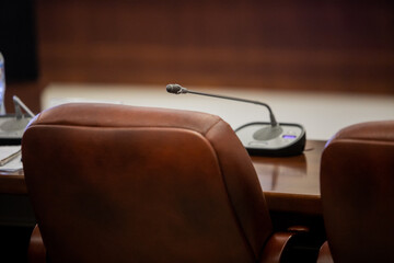 Conference room or seminar meeting room in business event. Session of Government. Academic classroom training course in lecture hall. blur abstract background. working in modern bright office indoor