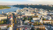 © Iuliia Sokolovska - Aerial top view of Kyiv cityscape, Dnieper river and Podol historical district skyline from above, city of Kiev, Ukraine