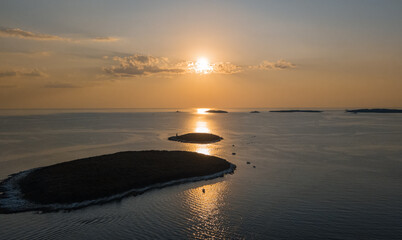 Drone view of the two sisters Mala and Velika islands at sunset in Rovinj Croatia