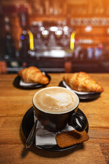 Wall Mural - Cup of coffee and croissant