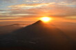 © ChrisOvergaard - Sunrise hiking and camping on the top of the active Volcan Acatenango while the Volcano Fuego is erupting - Guatemala
