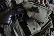 Tactical unloading vest with magazines and integrated holster - selective focus 
