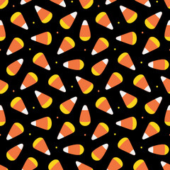 Wall Mural - Candy corns and dots vector cartoon style seamless pattern background. Halloween trick or treat sweets background.