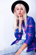 © iordani - young pretty blond girl hipster in hat posing smiling happy isolated on white background, lifestyle people concept