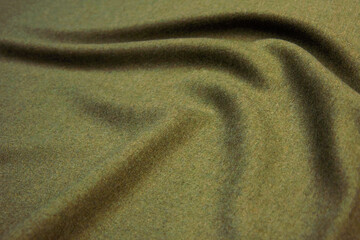 Wall Mural - Background texture, pattern. cloth wool suit green. A genuine flannel is always made of carded yarn, carded flannel is ideal in the cold months of the year, it is heavy, cozy and soft.