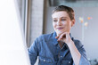 © UWE_UMSTAETTER/Westend61 - Portrait of smiling businesswoman at desk in office