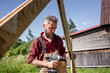 © Vasily Pindyurin/Westend61 - Carpenter man drilling with power tool while making playhouse