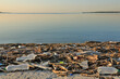 © Olena Shvets - Landscape of polluted with plastic garbage shore of the lake on the sunset. Environmental disaster concept