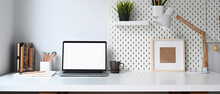 Mockup Blank Screen Laptop And Office Supplies On White Desk.