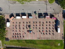 An Aerial Top Down View Of A Food Truck Park Area