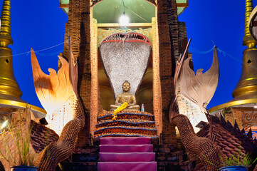 Samut Sakhon / Thailand / August 30, 2020 : Place of precepts practice 5, Baan Saphan Dam, With the image of the fourth Buddha on the head of the Buddha image