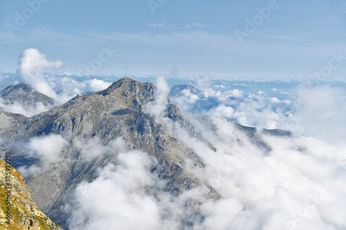 Fotomural The Mucrone mountain, a beautiful mountain in the Biellese pre-Alps, shrouded in fog