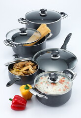 Cookware are types of food preparation containers, commonly found in a kitchen.